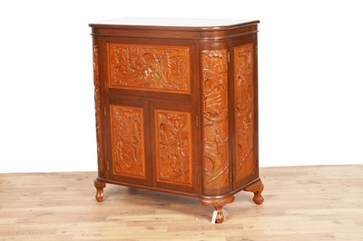 Lot 38 - An Oriental carved hardwood drinks cabinet