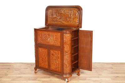 Lot 38 - An Oriental carved hardwood drinks cabinet