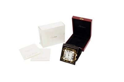 Lot 680 - Cartier Santos: a gilt cased alarm timepiece