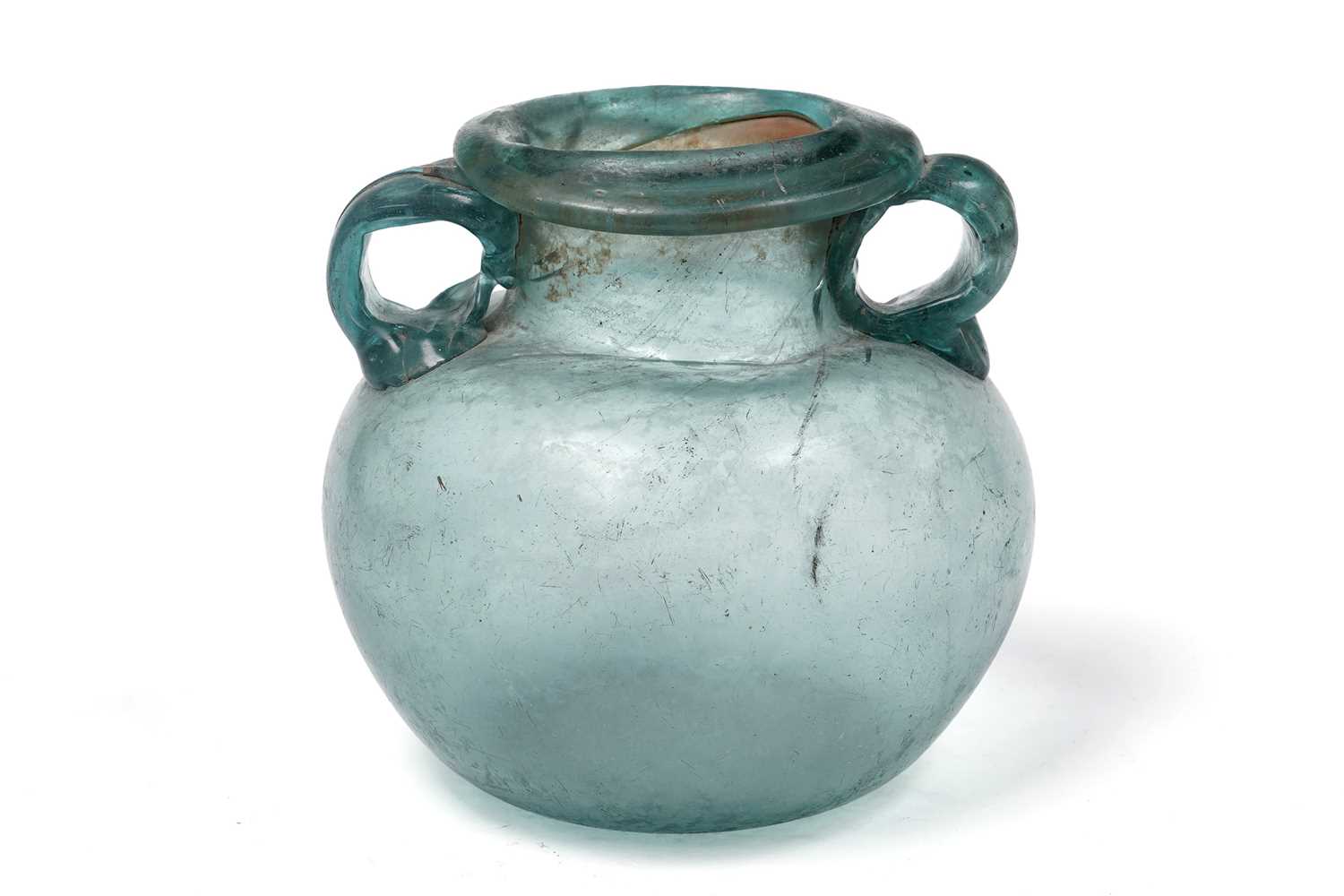 Lot 654 - A Roman blue glass urn