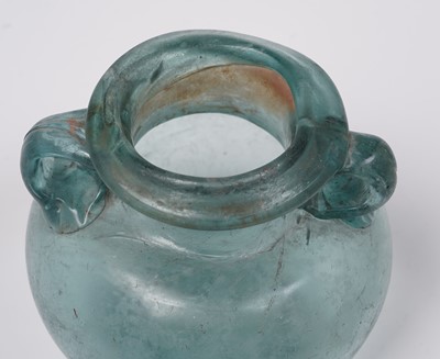 Lot 654 - A Roman blue glass urn