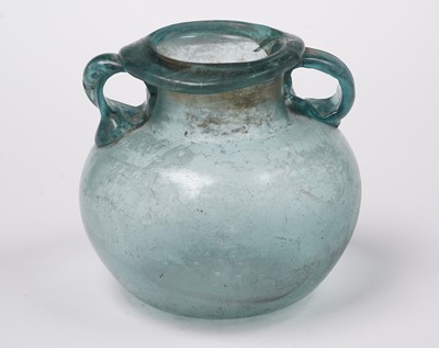 Lot 654 - A Roman blue glass urn