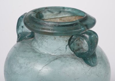 Lot 654 - A Roman blue glass urn