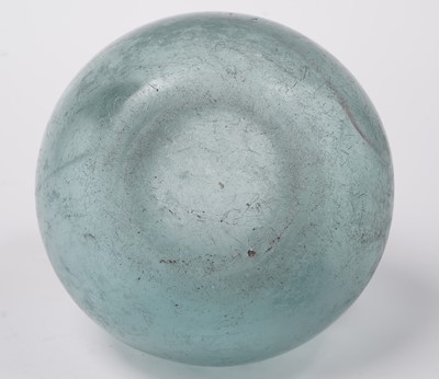 Lot 654 - A Roman blue glass urn