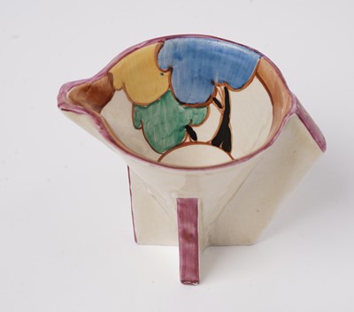Lot 508 - A Clarice Cliff 'Blue Autumn' pattern cream jug; and a crocus pattern preserve jar and cover