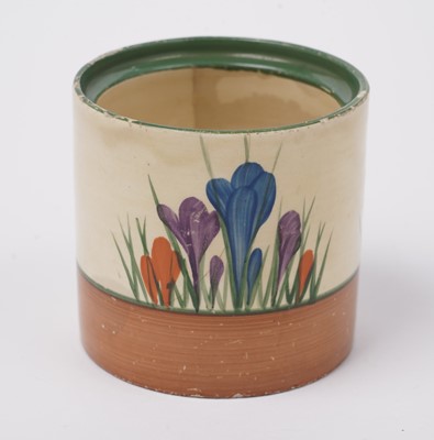 Lot 508 - A Clarice Cliff 'Blue Autumn' pattern cream jug; and a crocus pattern preserve jar and cover