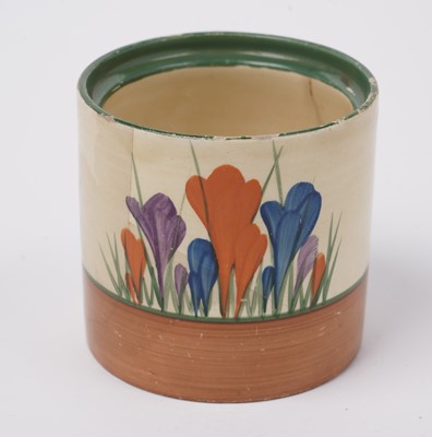 Lot 508 - A Clarice Cliff 'Blue Autumn' pattern cream jug; and a crocus pattern preserve jar and cover
