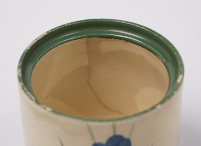 Lot 508 - A Clarice Cliff 'Blue Autumn' pattern cream jug; and a crocus pattern preserve jar and cover