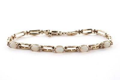 Lot 171 - An opal and diamond bracelet