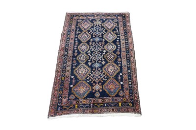 Lot 305 - A Persian hand-made Kurdish carpet