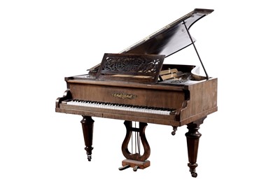 Lot 970 - An early 20th Century walnut baby grand piano