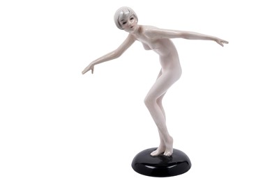 Lot 449 - Goldscheider: figure of a nude dancer | earthenware