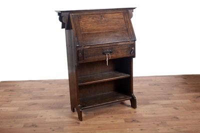 Lot 73 - A late 19th Century oak bureau