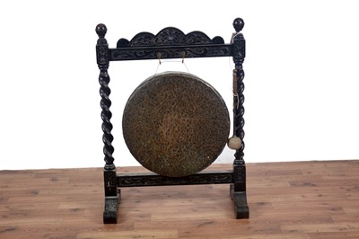 Lot 93 - An early 20th Century ebonised framed dinner gong