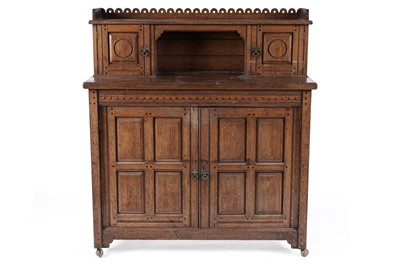 Lot 728 - An Arts & Crafts oak side cabinet