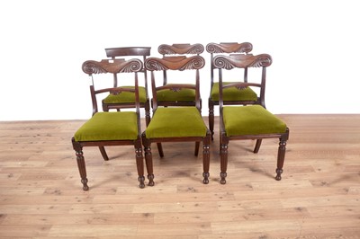 Lot 101 - A set of five carved mahogany Regency dining chairs