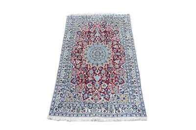 Lot 1199 - A Persian hand-made Nain rug