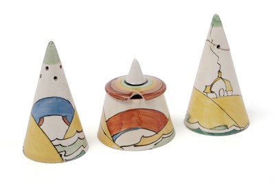 Lot 599 - A Clarice Cliff Bizarre three-piece conical shaped cruet