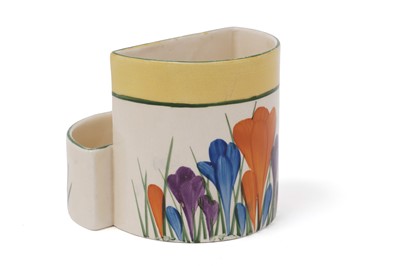 Lot 601 - A Clarice Cliff Bizarre ‘Crocus’ pattern cigarette holder and match striker