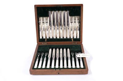 Lot 157 - An Edwardian canteen of fruit knives and forks