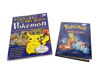 Lot 604 - An album of Pokemon cards; and copy of Pojo's Unofficial Big Book of Pokemon