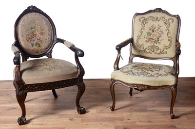 Lot 9 - Two Victorian-style carved mahogany armchairs