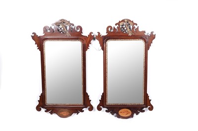 Lot 717 - A near pair of George III style mahogany pier mirrors