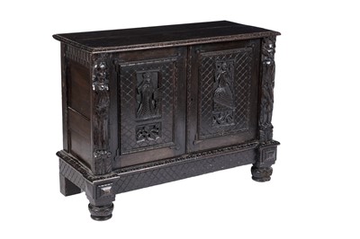 Lot 775 - A Victorian oak carved cupboard