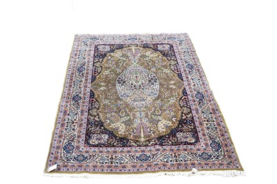 Lot 1210 - A hand-made Tabriz rug