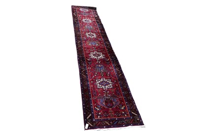 Lot 343 - A hand-made Heriz runner