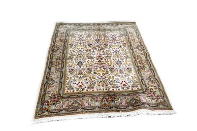 Lot 348 - A Persian hand-made Tabriz Tabatabaei rug