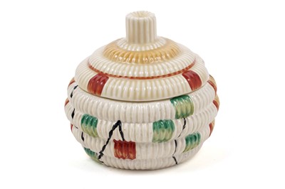 Lot 522 - A Clarice Cliff ‘Raffia Indiana’ pattern sugar bowl and lid