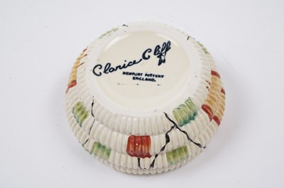 Lot 522 - A Clarice Cliff ‘Raffia Indiana’ pattern sugar bowl and lid