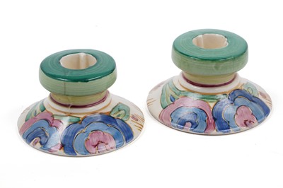 Lot 548 - A pair of Clarice Cliff Bizarre ‘Blue Chintz’ pattern dwarf candlesticks