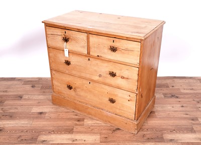 Lot 25 - A Victorian stripped pine chest of drawers