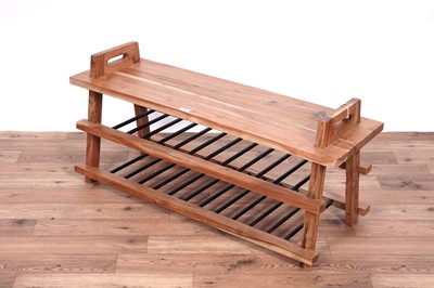 Lot 23 - A stylish hardwood shoe rack