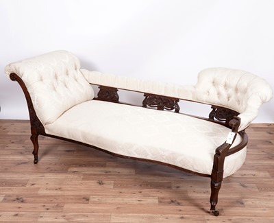 Lot 80 - A late Victorian carved mahogany button back chaise longue/sofa