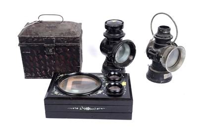 Lot 710 - Two railway lamps; an early 20th Century bait box; and a stereoscope slide viewer