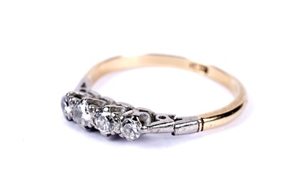 Lot 28 - A diamond four stone ring