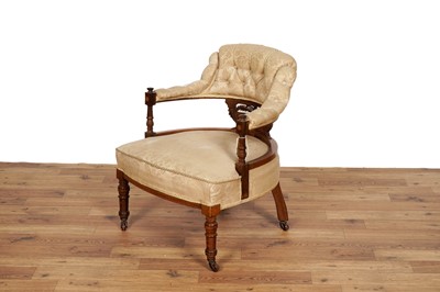 Lot 16 - An Edwardian walnut and satinwood inlaid button back tub armchair