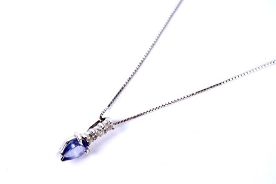 Lot 185 - A tanzanite and diamond pendant