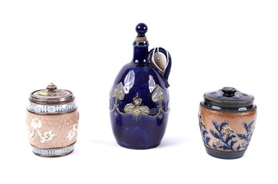 Lot 187 - Two Doulton Lambeth tobacco jars with covers; and other items