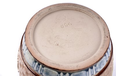 Lot 187 - Two Doulton Lambeth tobacco jars with covers; and other items