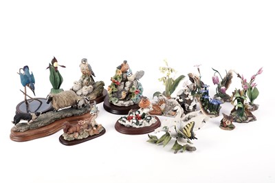 Lot 199 - A collection of Border Fine Arts animal figure groups; and Boehm Rare Wild Flower figures