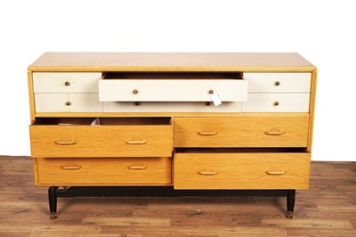 Lot 81 - Gomme: a light oak ‘China White’ sideboard/chest of drawers