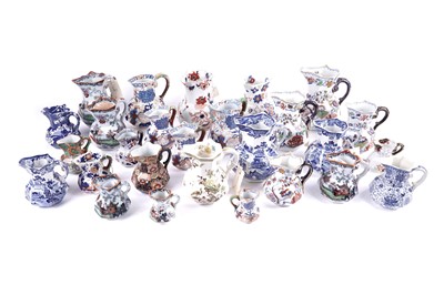 Lot 235 - A collection of early 20th Century and later ceramic jugs