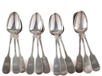 Lot 378 - A set of twelve Newcastle silver fiddle pattern tablespoons