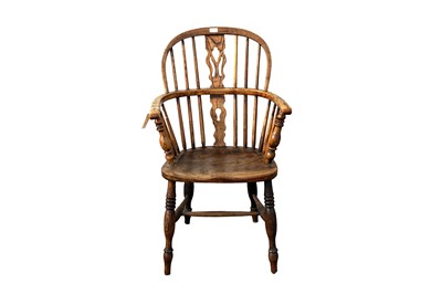 Lot 65 - A late 19th Century ash elm and oak Windsor armchair