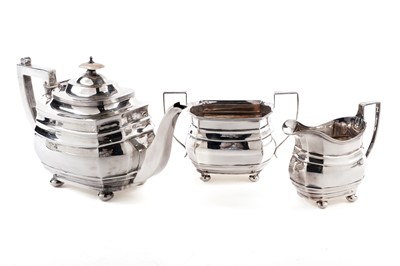 Lot 420 - A silver three-piece tea service