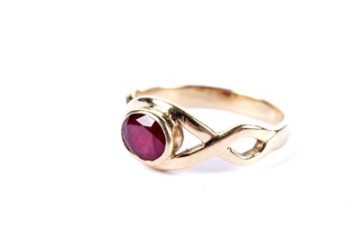 Lot 49 - A ruby single stone dress ring